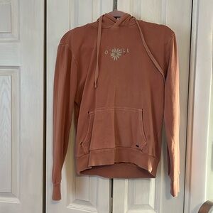 O’neil medium dull pinkish salmon colored hoodie